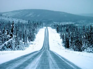 Alaska winter road with ice and snow
