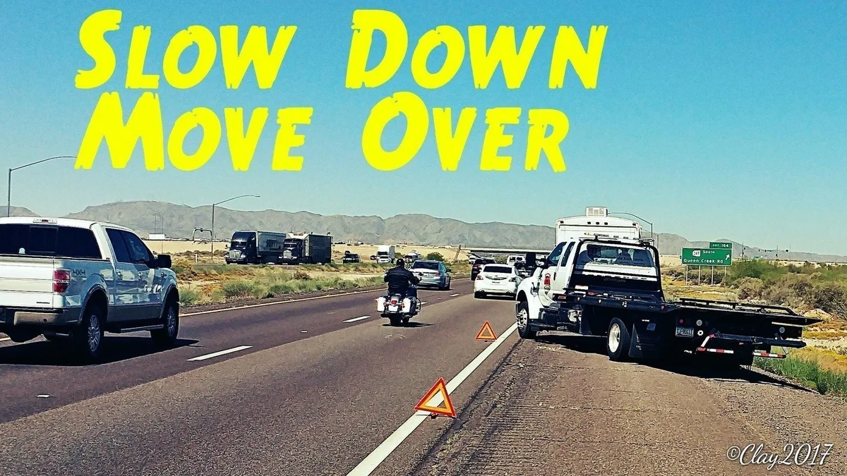 Arizona Move Over Slow Down road sign