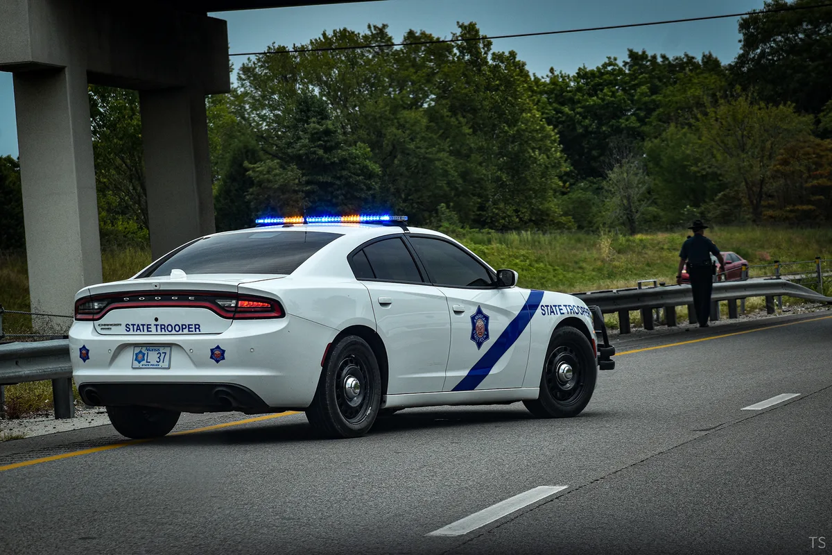 Arkansas state police patrol car with emergency lights