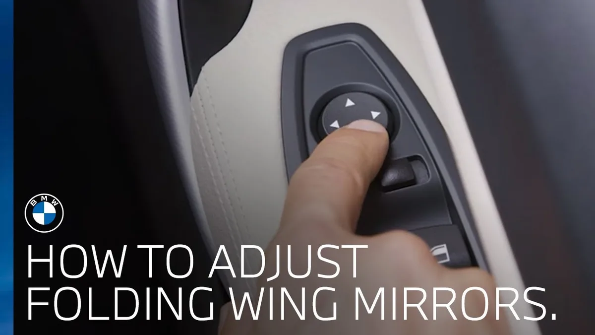 BMW folding mirror button door panel