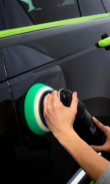 buffing wax off car with microfiber