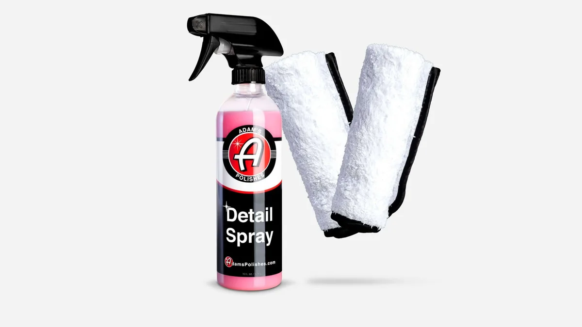 detailer spraying waterless wash