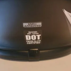 DOT certification sticker on motorcycle helmet