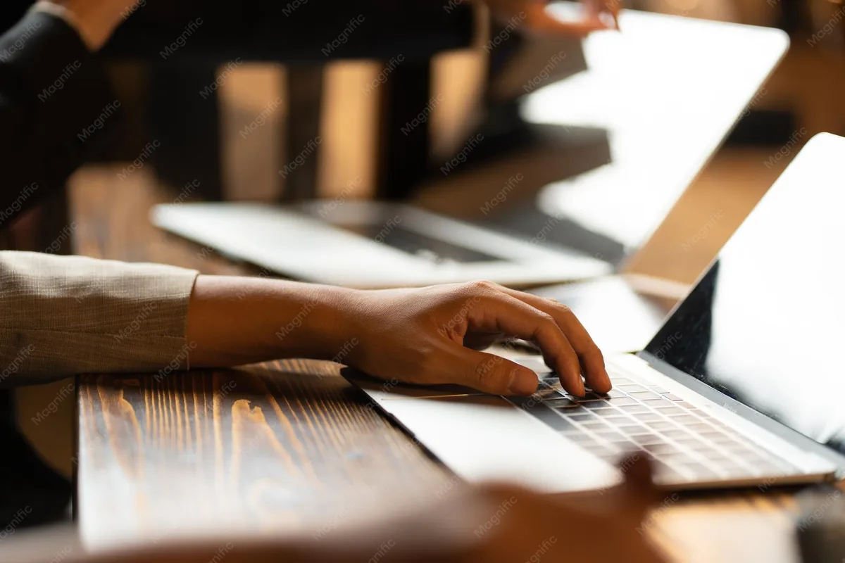 online account creation hands laptop