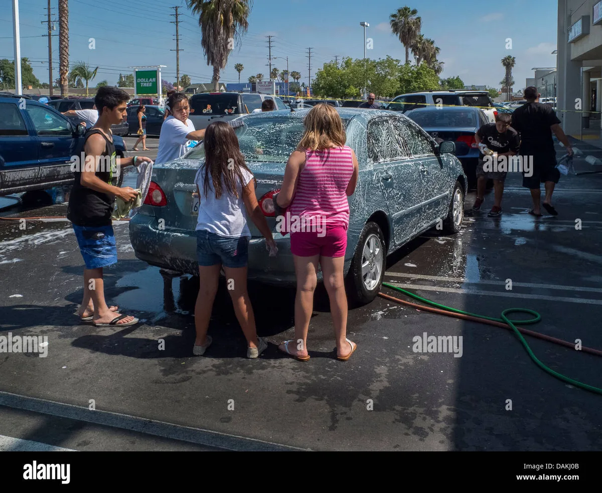 volunteers washing car fundraiser