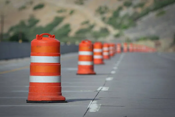 work zone lane closure with cones and barrels