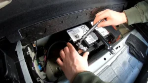 2020 BMW X5 front auxiliary battery bay location