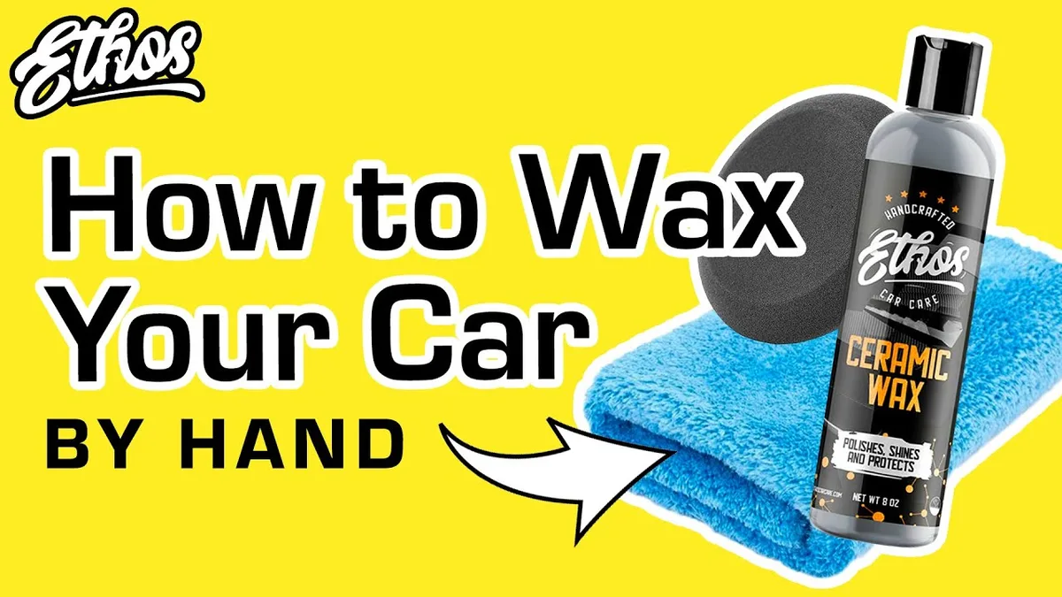 applying car wax with microfiber towel