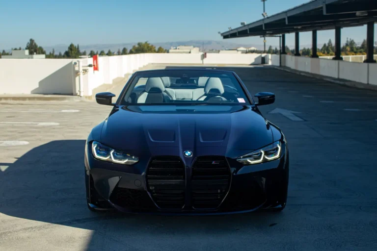 bmw m4 convertible in car wash