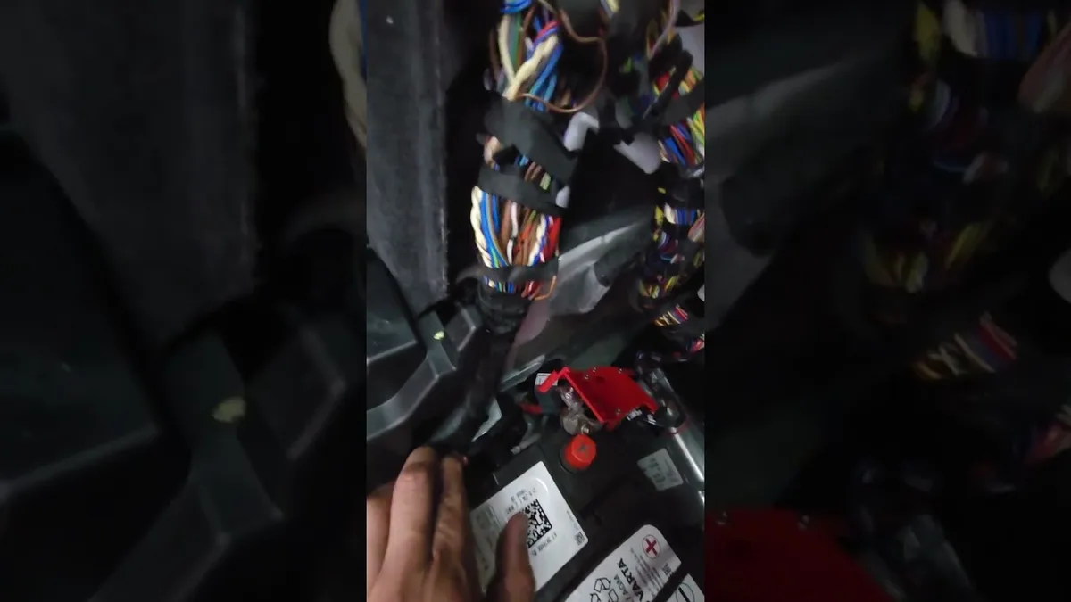 BMW X5 auxiliary battery bay diagram