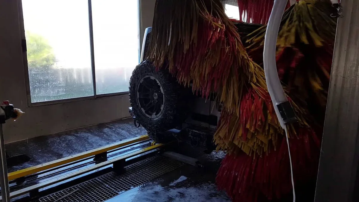 car wash damage from spare wheel