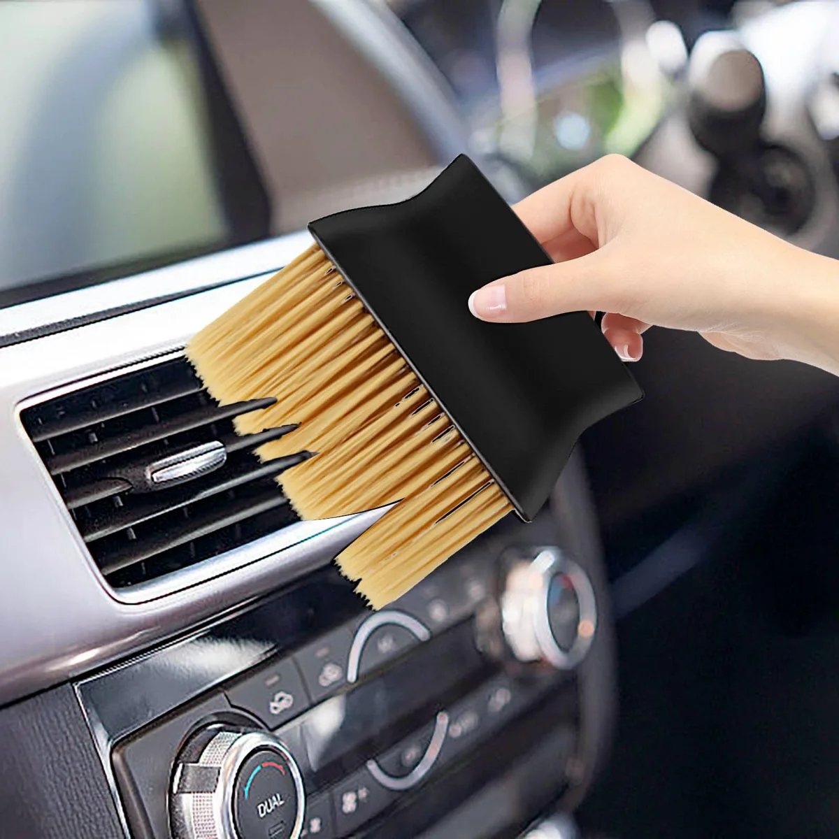 cleaning car air vents with brush
