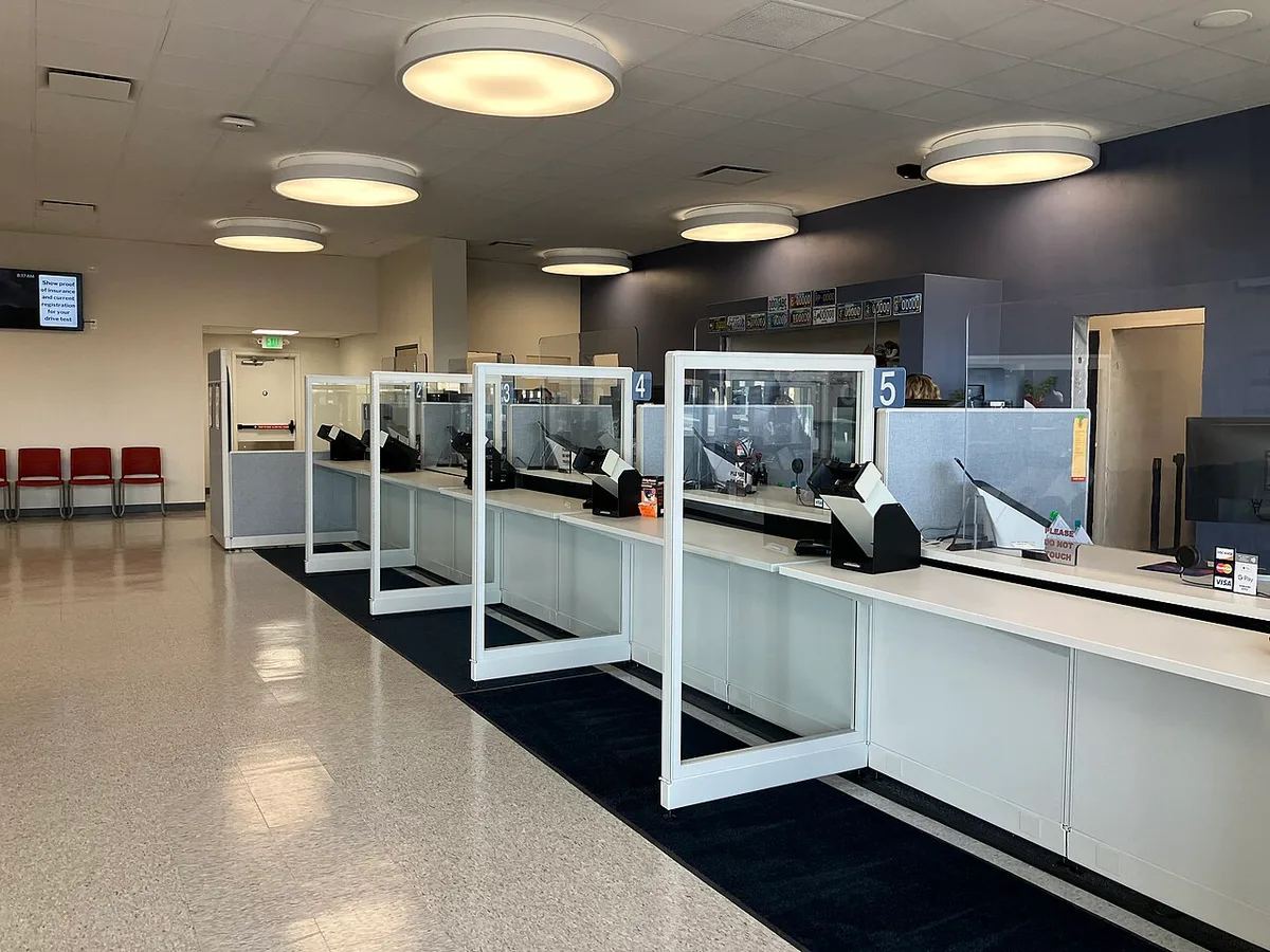 DMV office interior with service counters