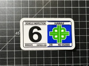 Hawaii safety inspection sticker on car windshield