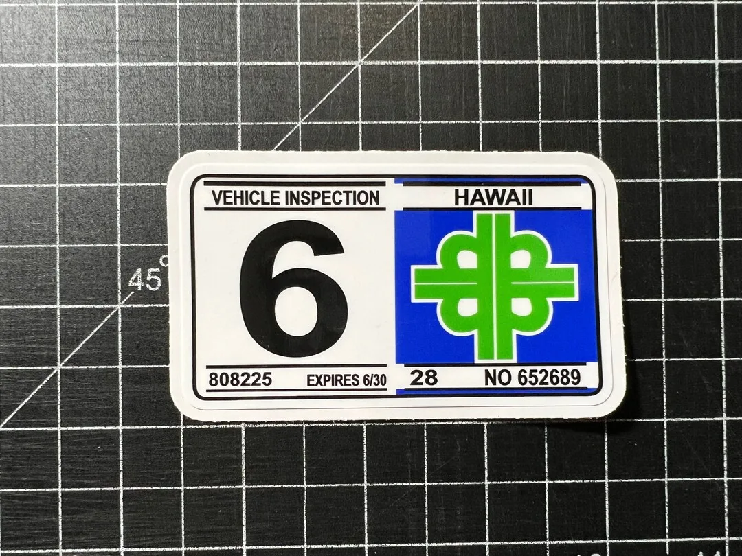 Hawaii safety inspection sticker on car windshield