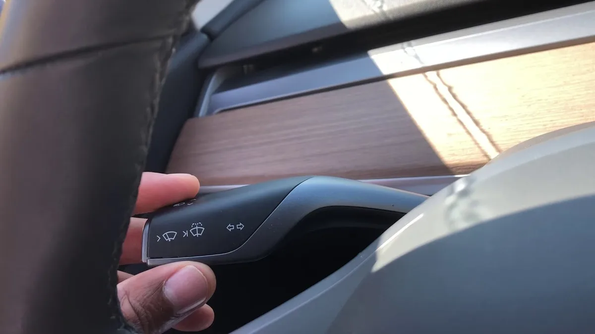 how to stop automatic windshield washing on tesla