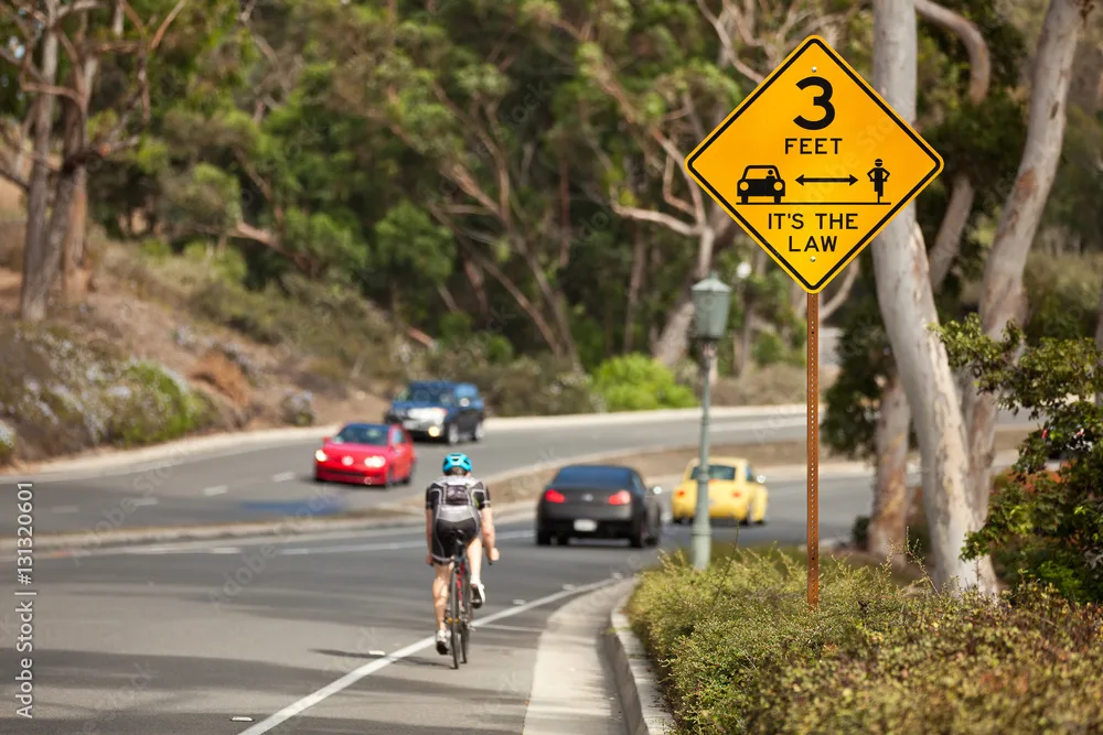 Iowa 3 foot passing distance requirement for bicycles on public roads