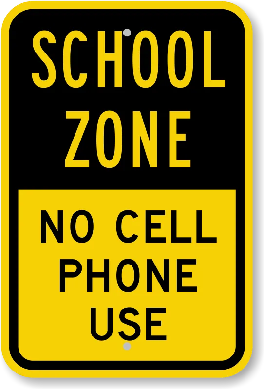 Kansas handheld cell phone ban sign in school zone