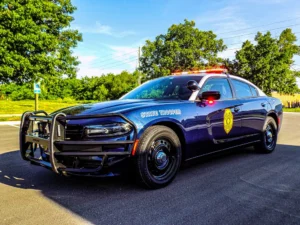 Kansas police car with blue and red lights