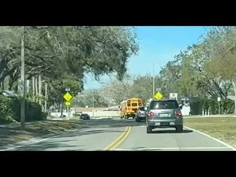 Maine school bus stop law opposite direction traffic