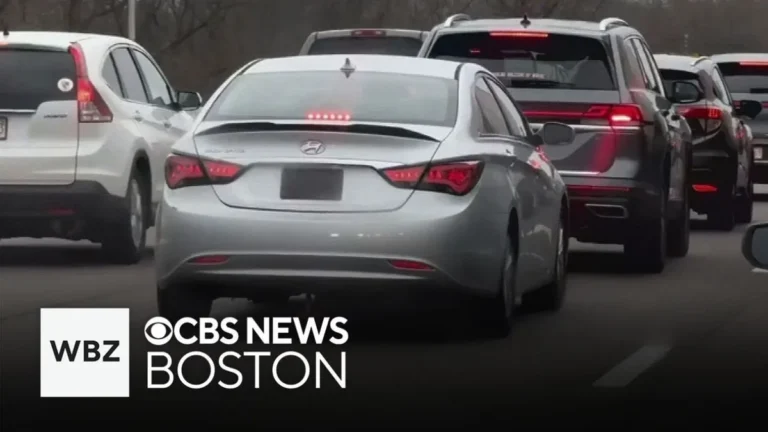 Massachusetts license plate with legal frame