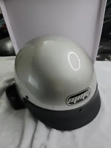 motorcyclist wearing DOT-approved helmet