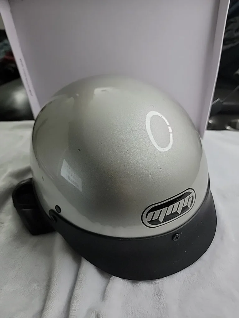motorcyclist wearing DOT-approved helmet