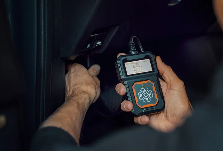 OBD-II scanner connected to car
