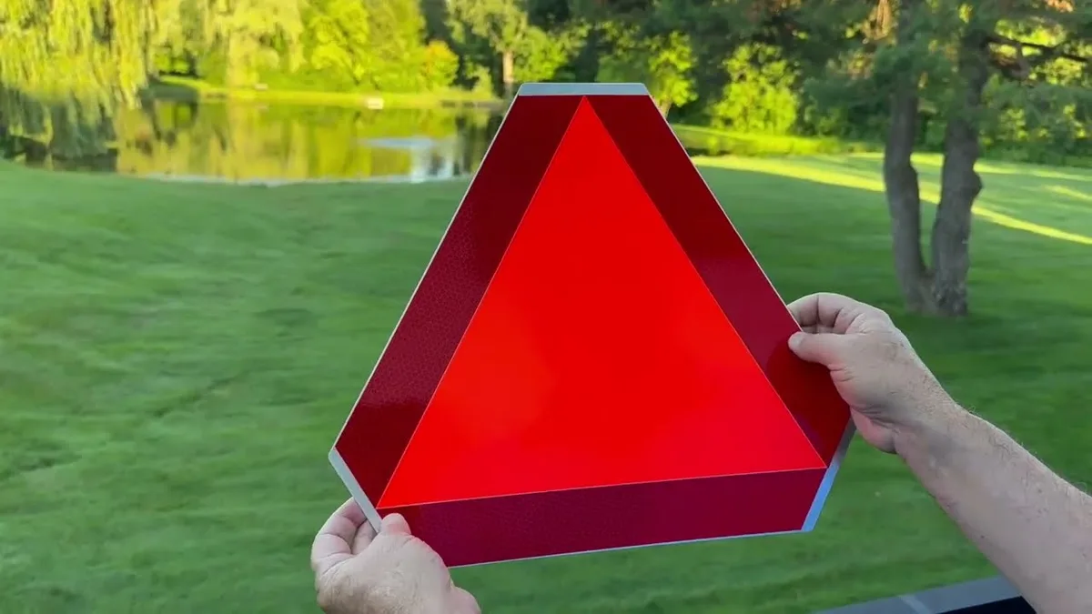slow moving vehicle SMV emblem triangle