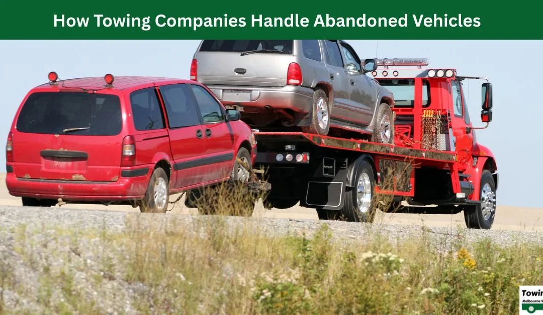 tow truck removing abandoned car
