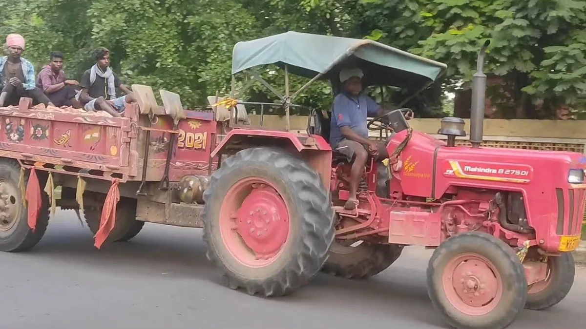 tractor pulling over to let cars pass on highway
