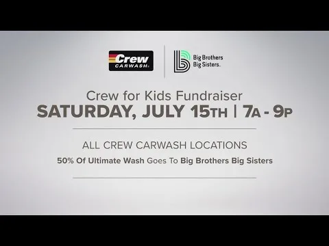 volunteers washing car at fundraiser