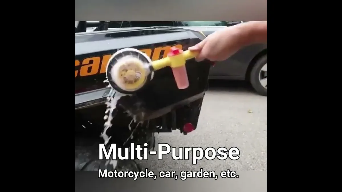 washing car with foam brush