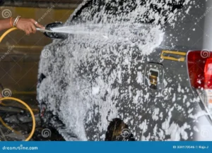 washing dusty car