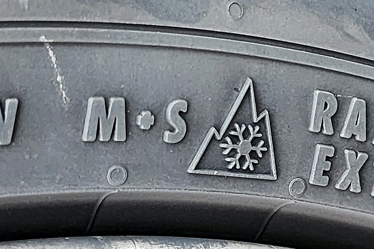 winter tire with Three-Peak Mountain Snowflake symbol