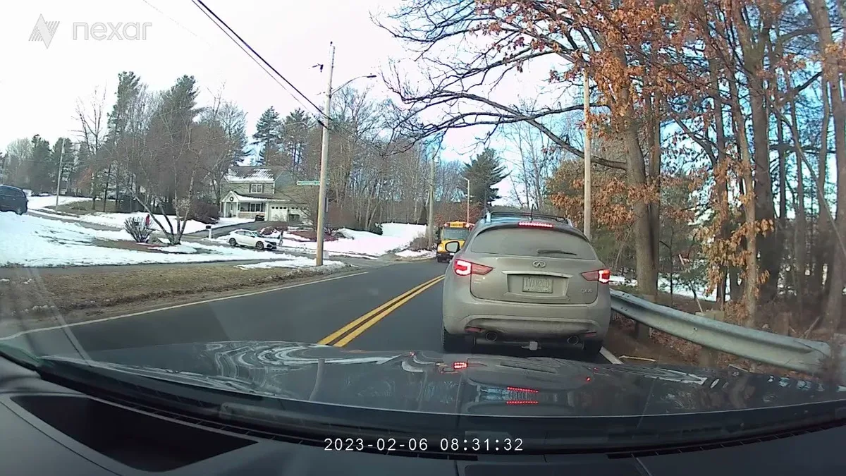 school bus flashing red lights stop arm close-up