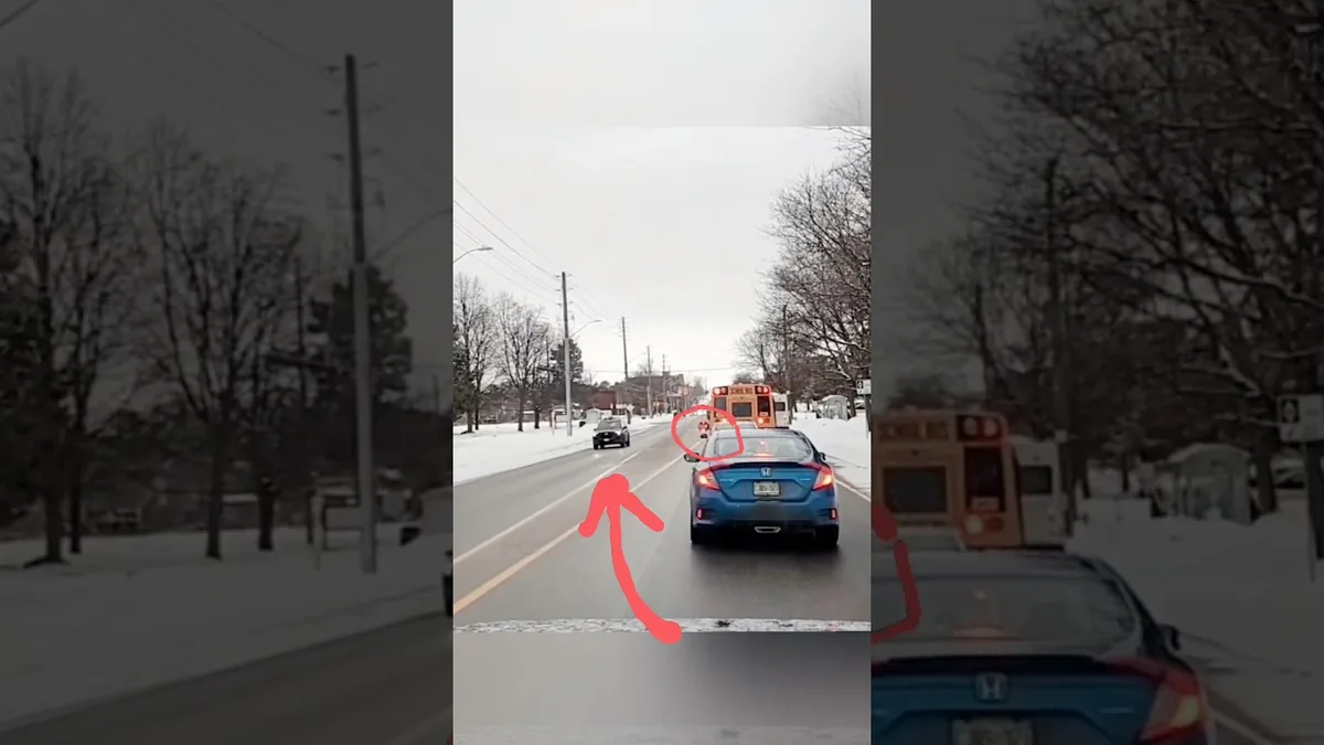 school bus stop arm and flashing lights