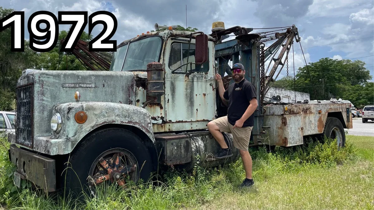 towing truck removing abandoned car