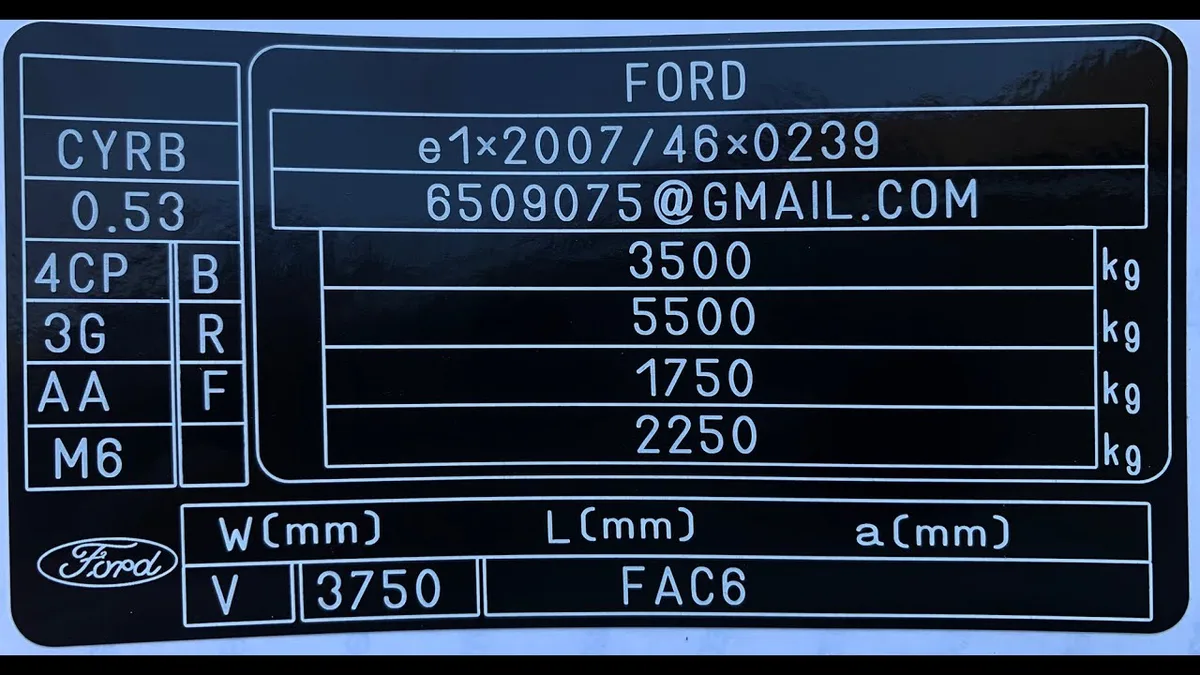 vehicle model year sticker close-up